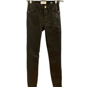 Frame coated black denim jeans